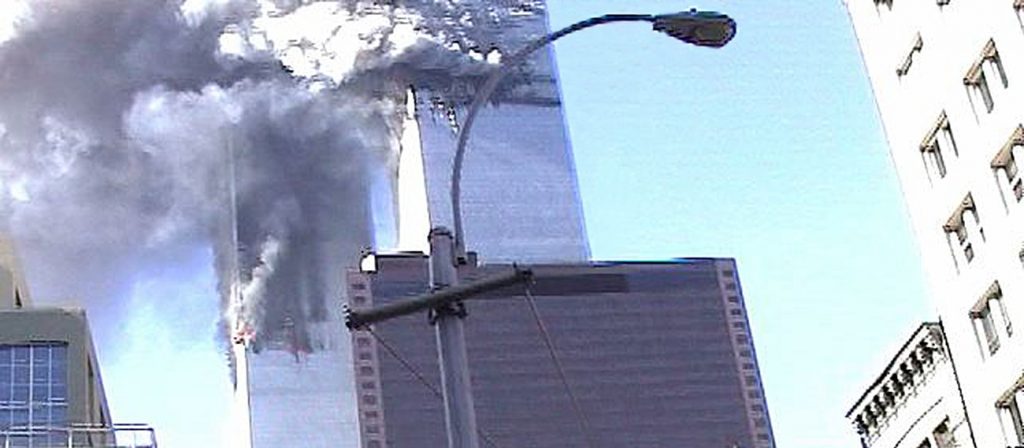 Glitter_Ad_With_Twin_Towers_Burning-min