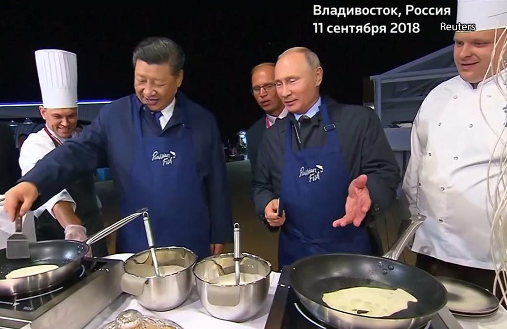 Reuters Путин Си Цзиньпин